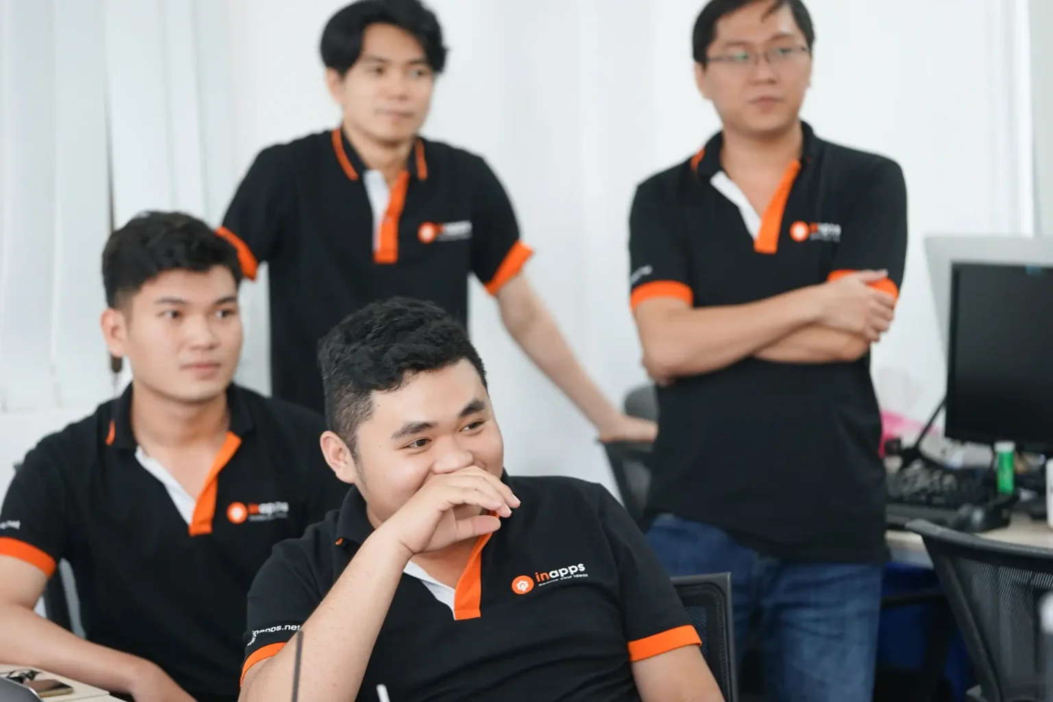 InApps engineers working at their desks in the Ho Chi Minh City office